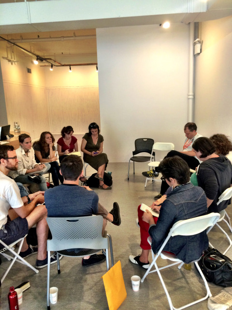 Participating artists discussing Cargo Space collaborative exhibition at A+D Gallery, Chicago. August 2014.