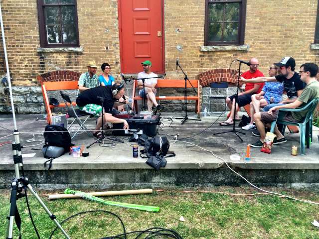 Artists discussing Cargo Space project at The Great Poor Farm Experiment, Little Wolf, Wisconsin. August 2014.