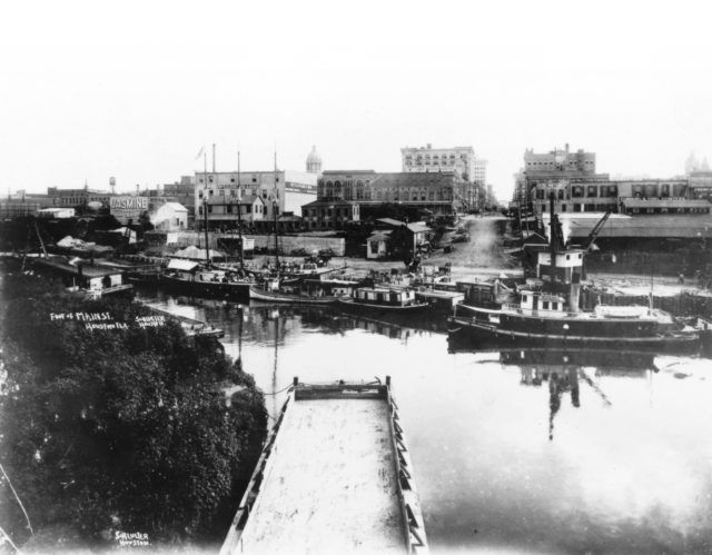  Early in the century, Buffalo Bayou thrived with commerce all the way to Main Street. Photo courtesy Houston Public Library, Houston Metropolitan Research Center.